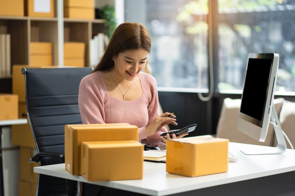 Women start small business selling products online for checking the product
